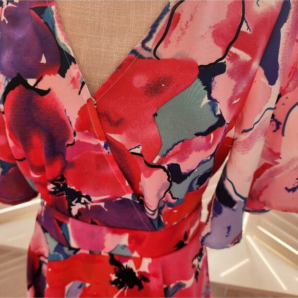 92 Umgee Floral Print Short Bell Sleeve V-Neck Romper with a Waist Tie - Picture 3 of 6